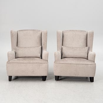 A pair of easy chairs, 21st century.