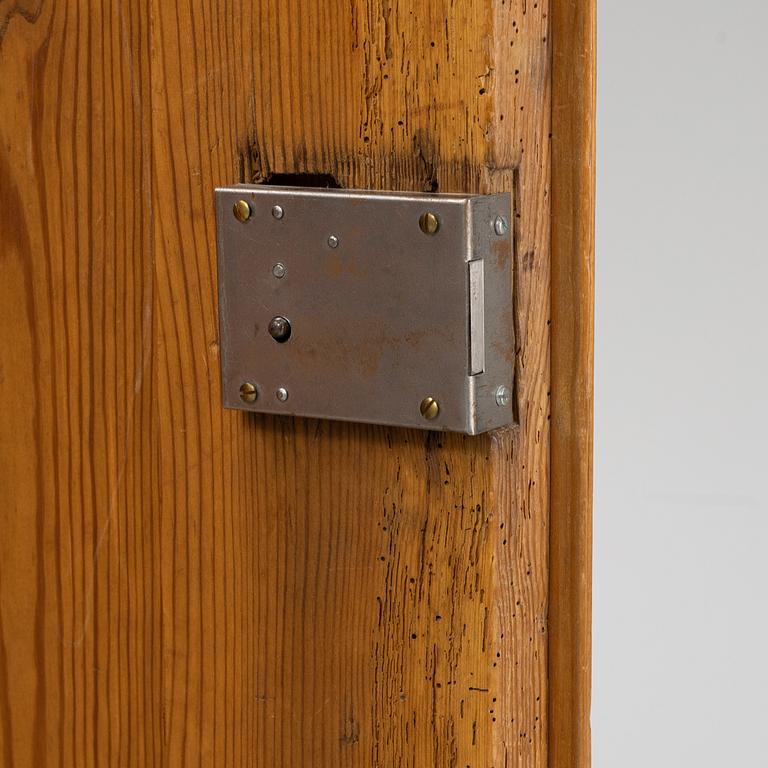 A pinewood cabinet, later part of the 19th Century.