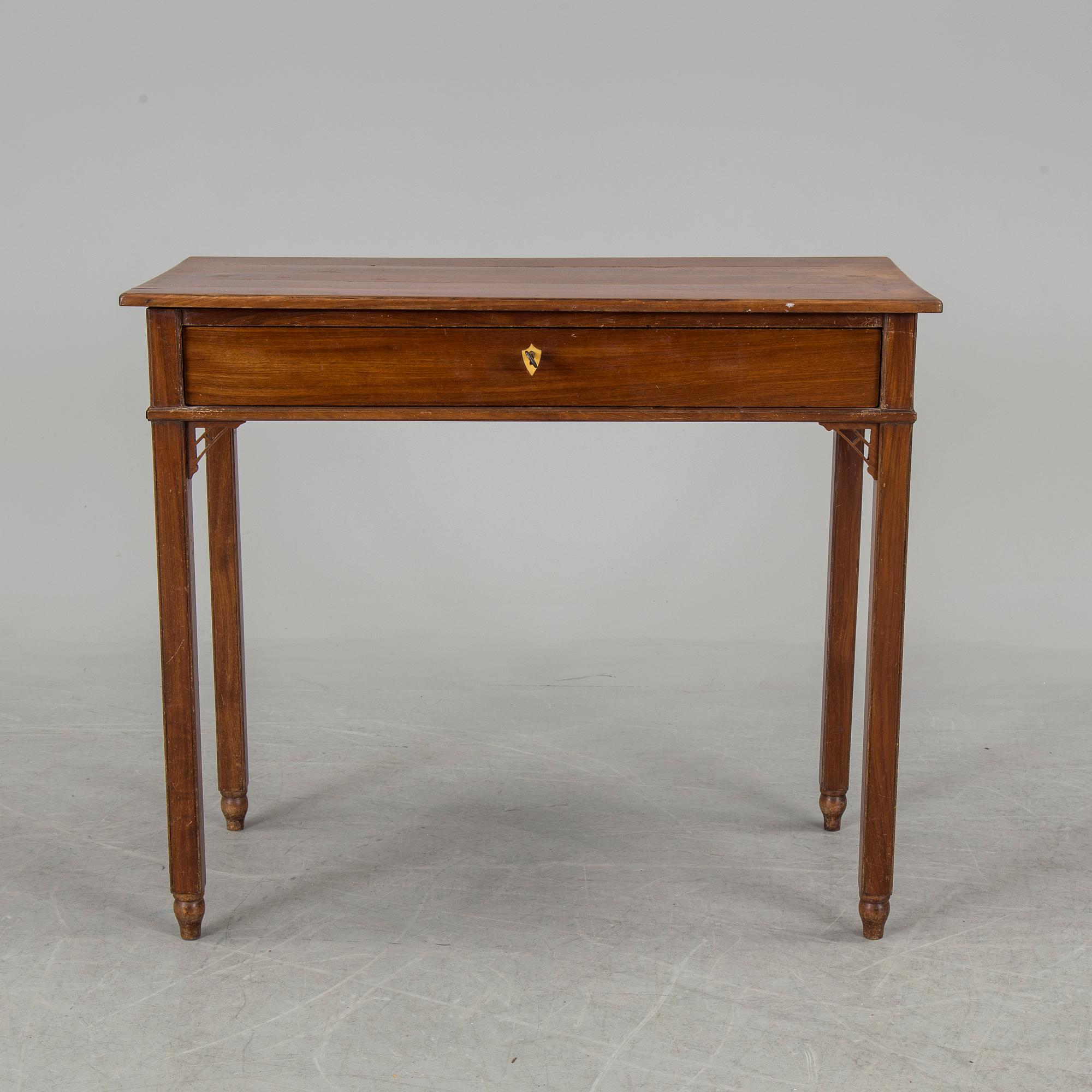 In the manner of the artist, a early 19th century late Gustavian table veneered with mahogany.