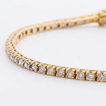 DIAMOND BRACELET 18k gold w 70 brilliant-cut dimaonds approx 3 ct in total.