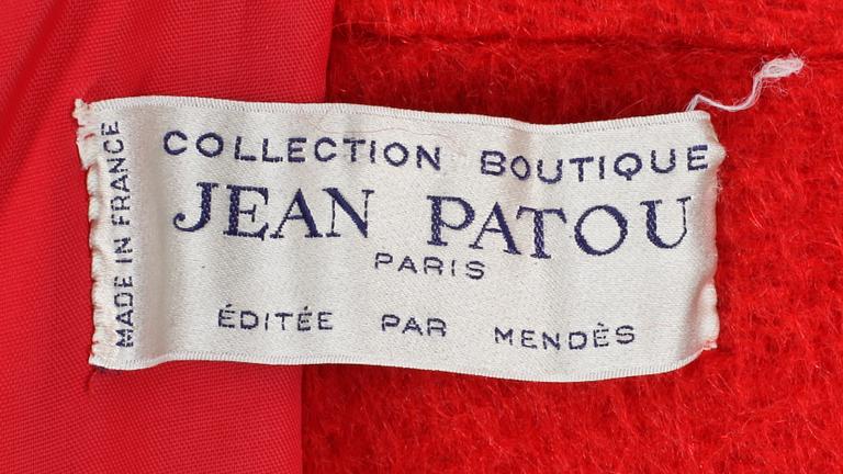 A 1960s/70s red wool coat by Jean Patou.