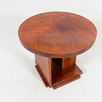 An Art Deco walnut coffee table.