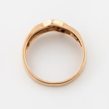 A single cut diamond ring.