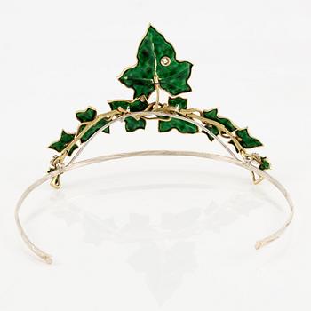 A necklace/tiara combination in 18K gold and green enamel set with old-cut diamonds.