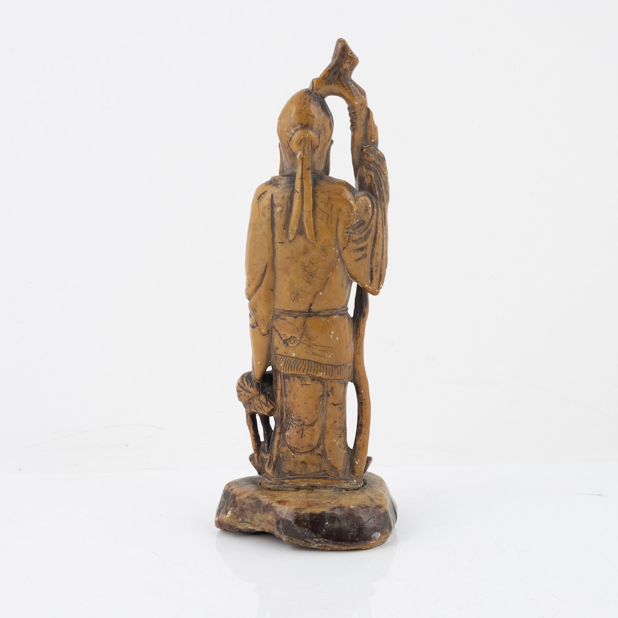 A soapstone figure of sholaou, China, 20th Century.