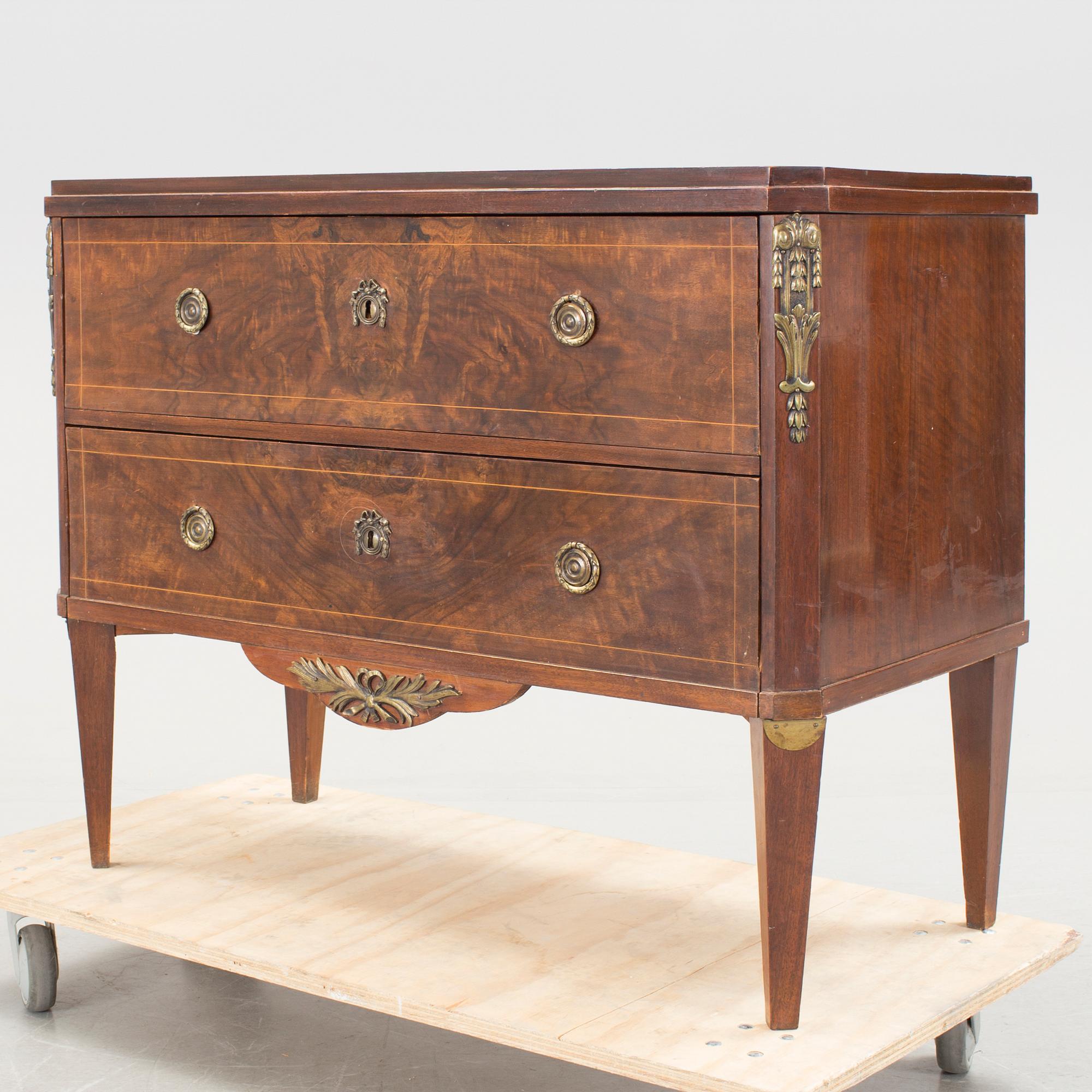 A gustavian style chest of drawers, late 19th century.