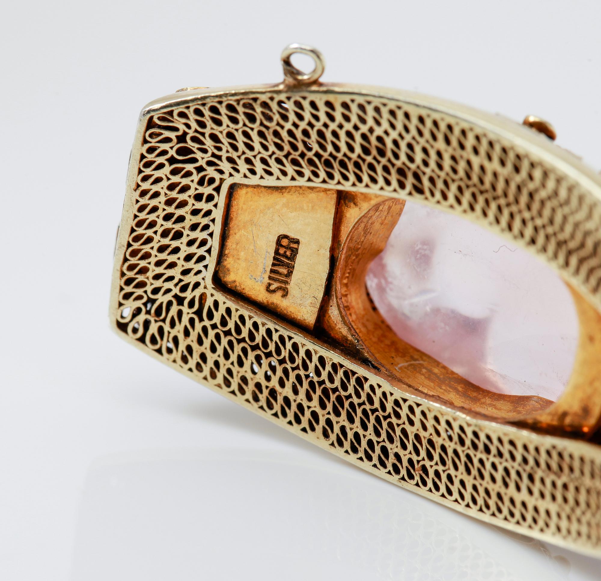 ARMBAND, förgyllt silver och rosatonade stenar, 1900-talets första hälft.