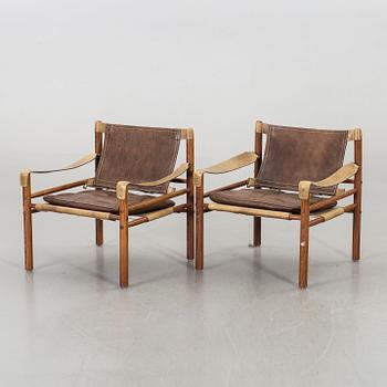 A PAIR OF ARNE NORELL "SIROCCO" ARMCHAIRS, 1960's.