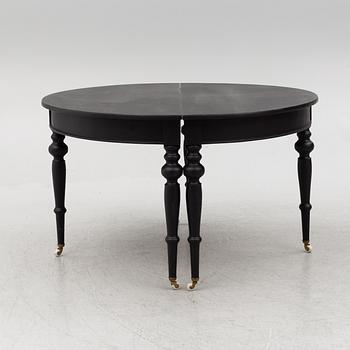 A dining table, late 19th Century.