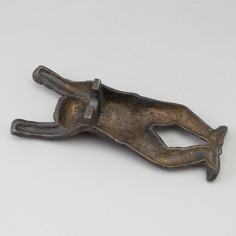 A Swedish cast iron boot jack, 20th century.