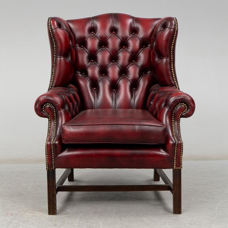 A late 20th Century leather easy chair.