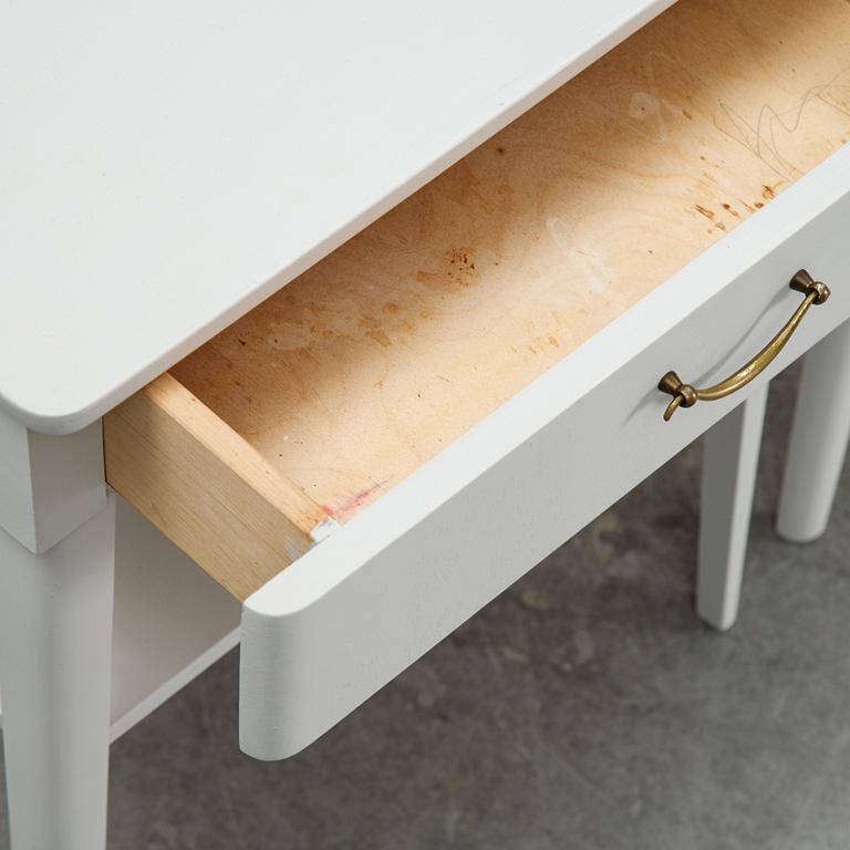 A pair of mid 20th century bedside tables.