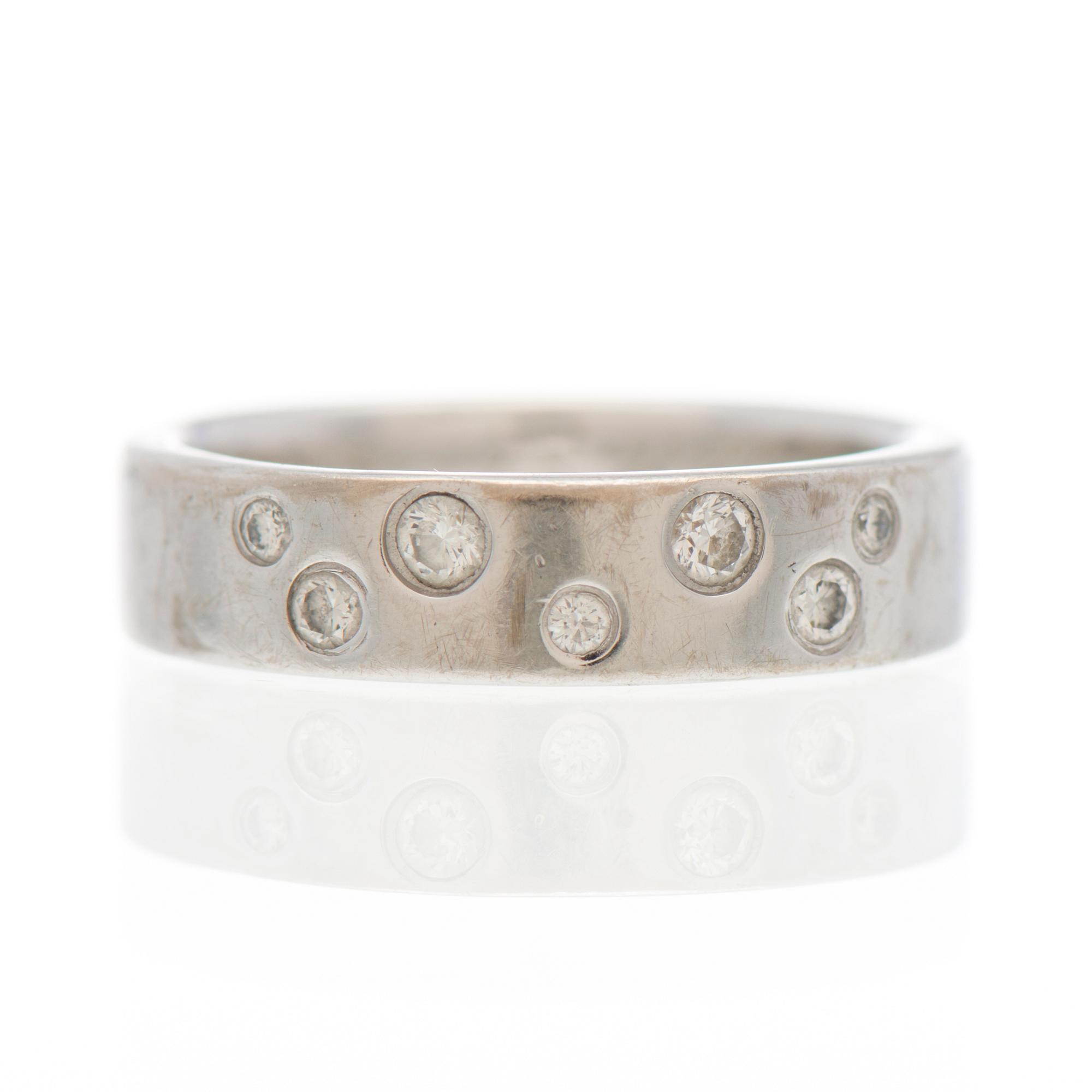 RING, briljantslipade diamanter, 14K vitguld. Kultasepät Andreasen, Tammerfors 2013.