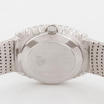 An 18K white gold and eight cut diamond Venus ladies watch.