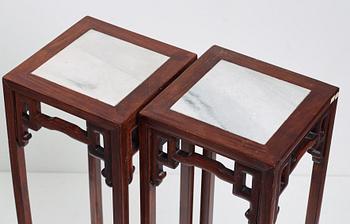 A pair of Chinese pidestals, 20th Century.