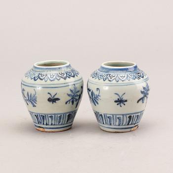 A pair of Chinese porcelain miniature jars, Ming dynasty (1368-1644).