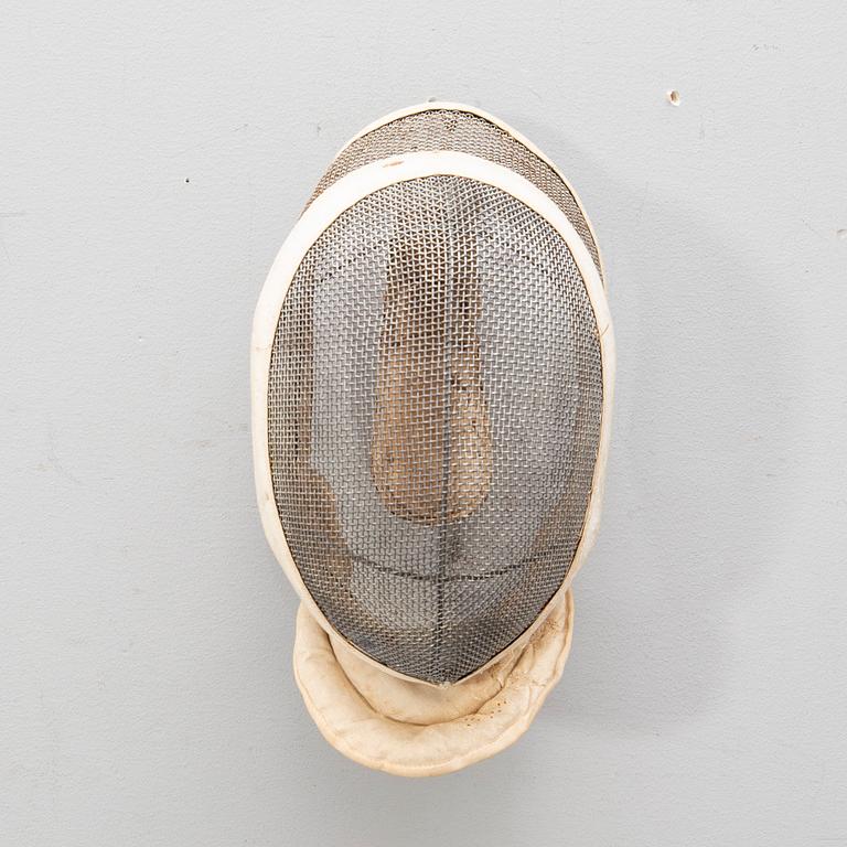 A French set of sword, mask and clothing for fencing, mid/second part of the 20th century.