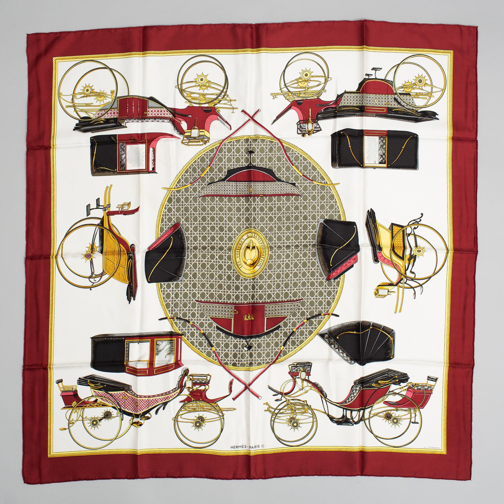 Hermès, a 'Les Voitures a Transformation' silk scarf.