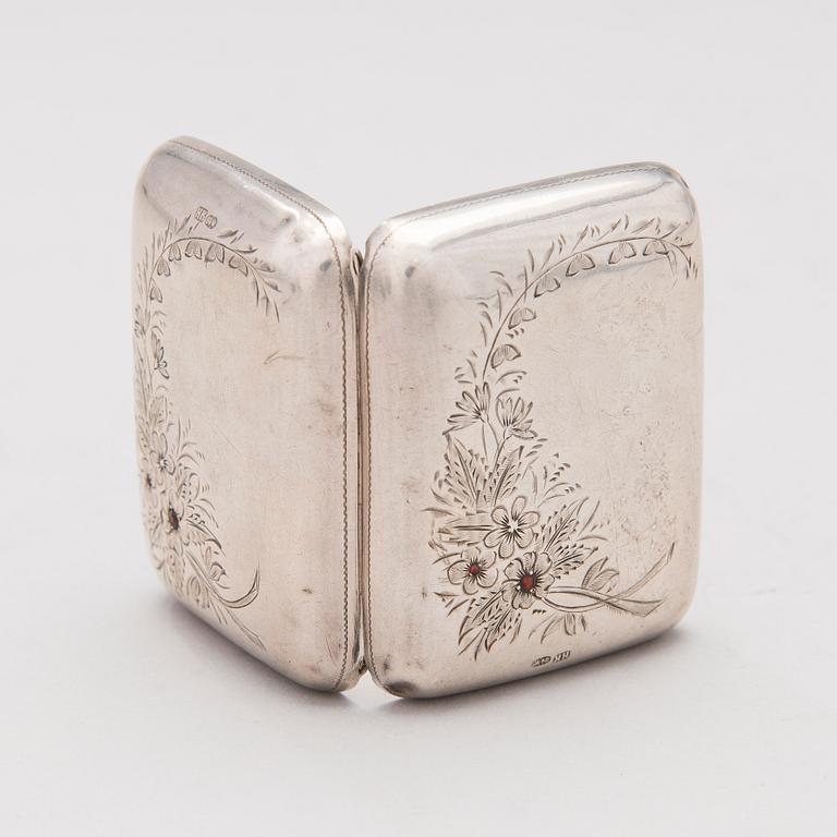 A silver case, Nikolai Kemper, and a pen and a paper knife in silver and enamel, import marks St Petersburg early 1900s.