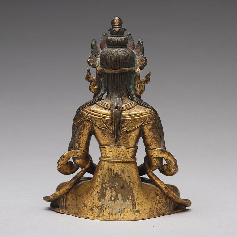 A gilt bronze figure of Amitayus buddha, Tibeto-Chinese, 18th Century.