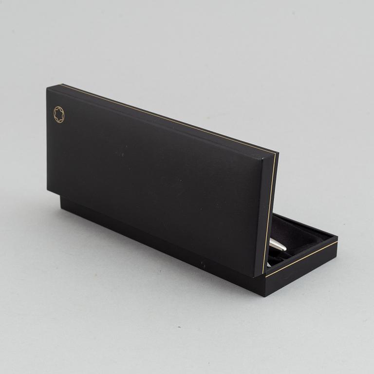 MOntblanc, a ball point pen and leather passport holder.