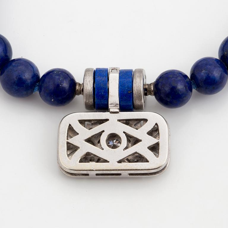 A Gaudy clasp and two necklaces.