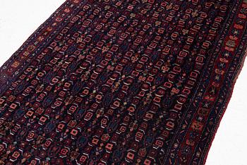 A semi-antique Bidjar carpet, c. 310 x 145 cm.