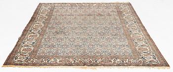 A Heris carpet, 305 x 205 cm.
