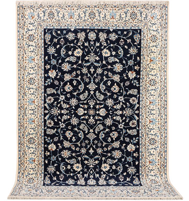 A part silk Nain rug, 9LA, c. 302 x 198 cm.