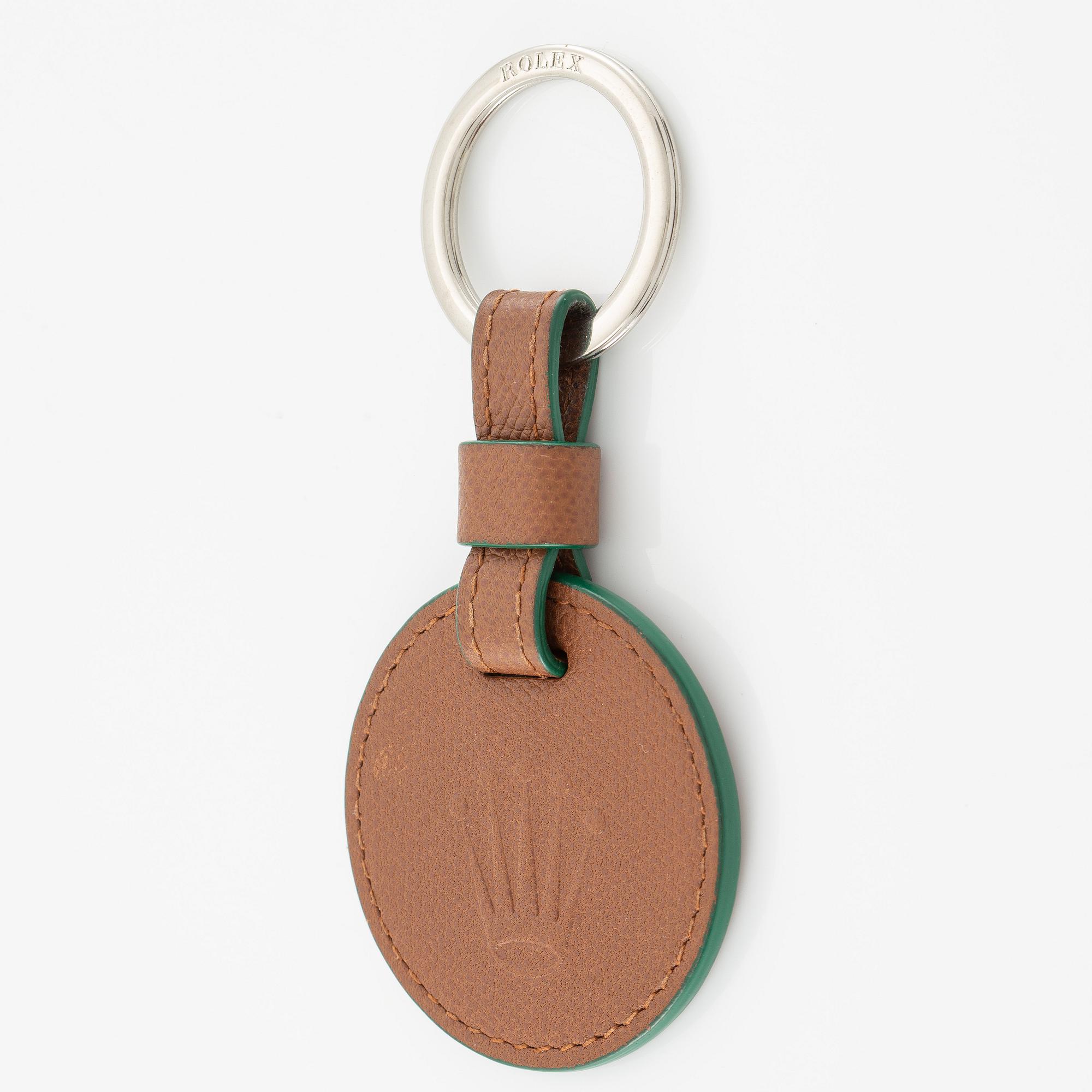 Rolex, key ring, "No Reserve", 59 x 120 mm.