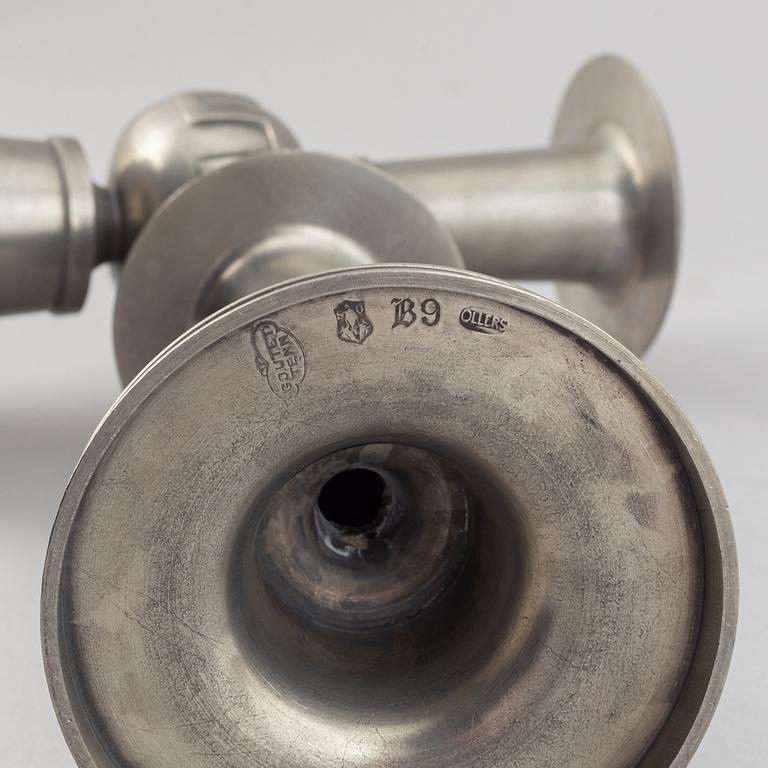 A pair of pewter candle holders by Edvin Ollers, 1952.