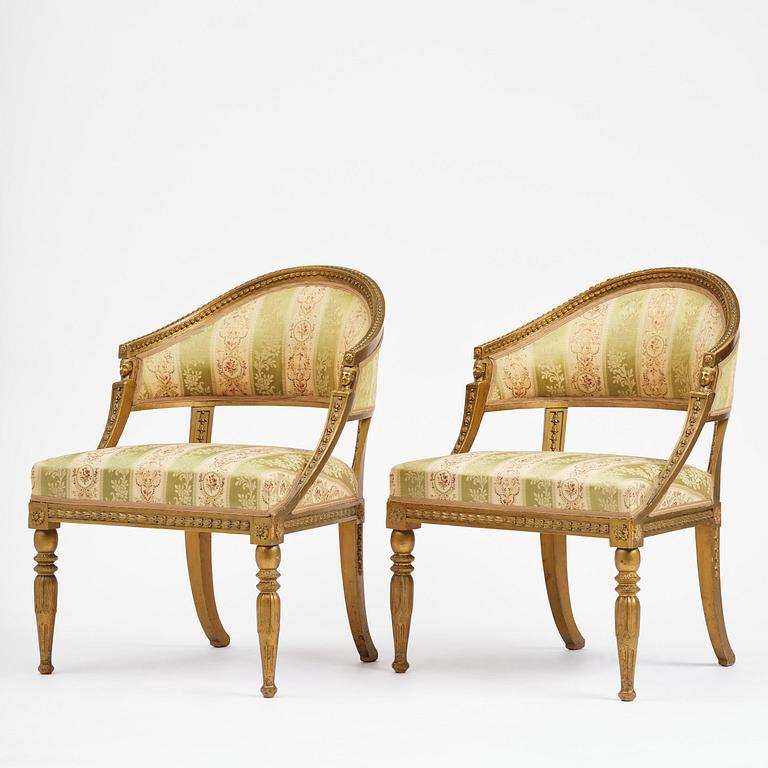 A pair of late Gustavian open armchairs attributed to E. Ståhl (master in Stockholm 1794-1820).