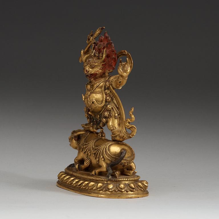 A Sinotibetan gilt bronze and lacquered figure of Yama, Qing dynasty, presumably 18th Century.