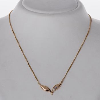 A NECKLACE, brilliant cut diamonds, 14K gold.