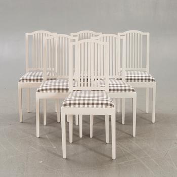 A set of six painted chairs around 1900.