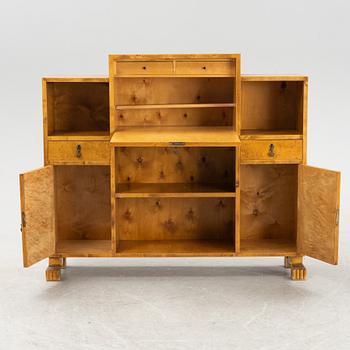 A 1930's birch veneered bookcase/sideboard.