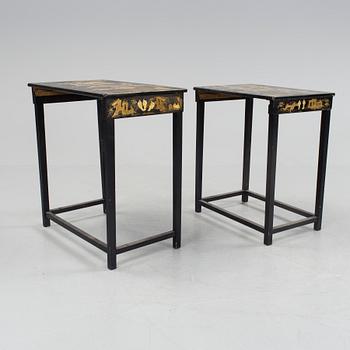 A set of two stacking tables with oriental motif, early 20th century.
