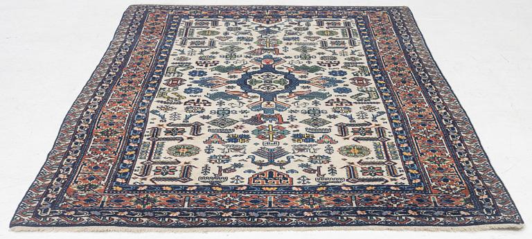 A figural oriental carpet, c. 205 x 134 cm.