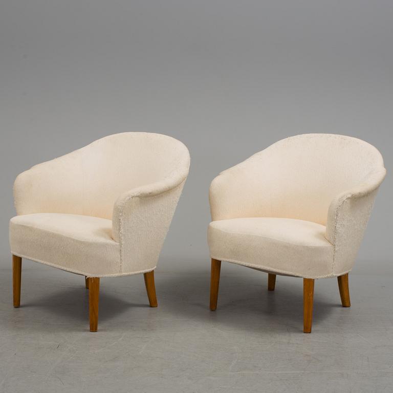 A pair of "Samspel" easy chairs by Carl Malmsten.