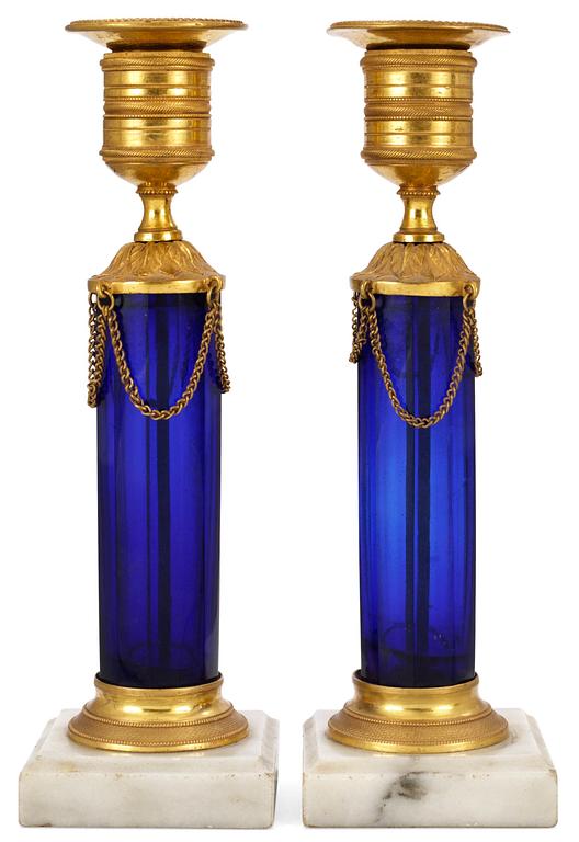 A pair of Gustavian candlesticks.