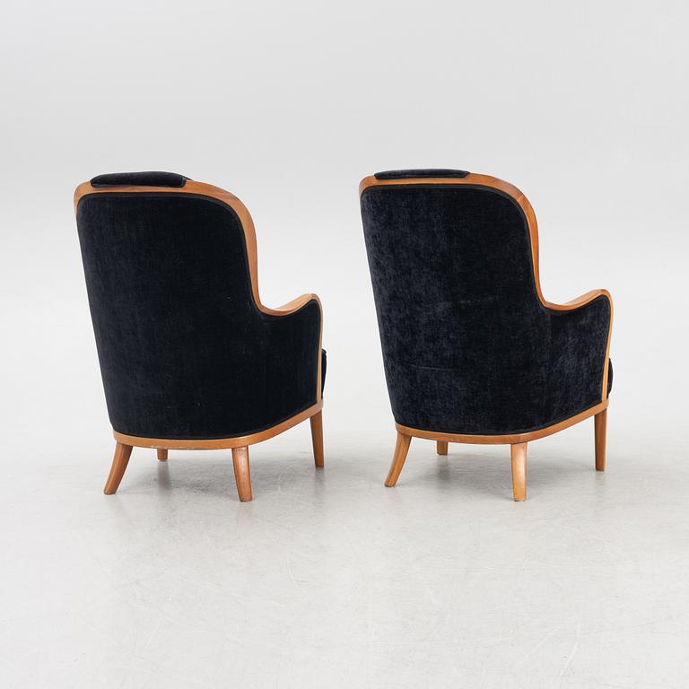 Carl Malmsten, a pair of 'Advokaten' armchairs, second half of the 20th Century.