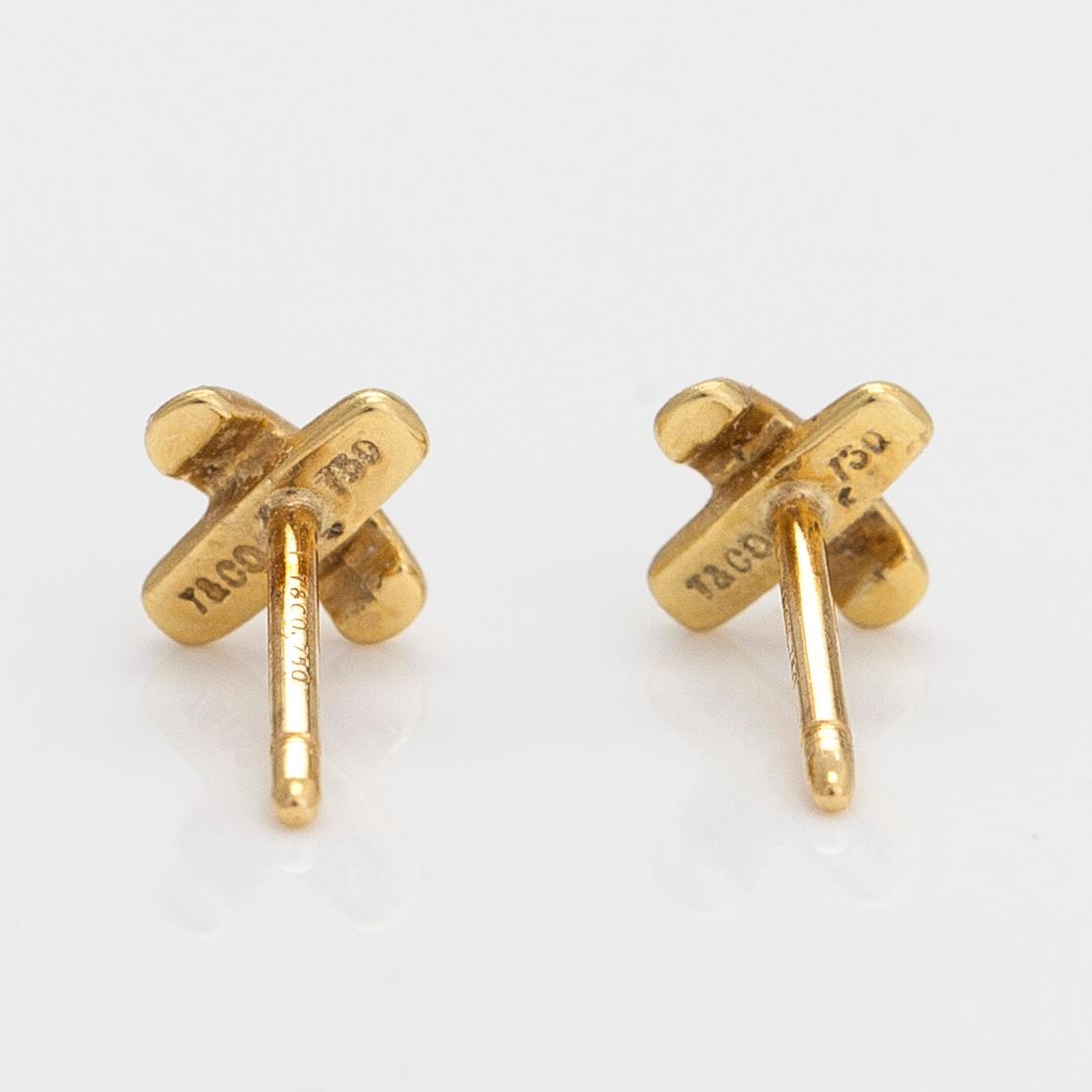 Tiffany Co a pair of 18K gold Cross Stitch earrings. Bukowskis