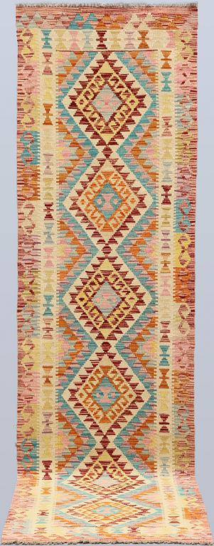 A Kilim runner, c. 293 x 78 cm.