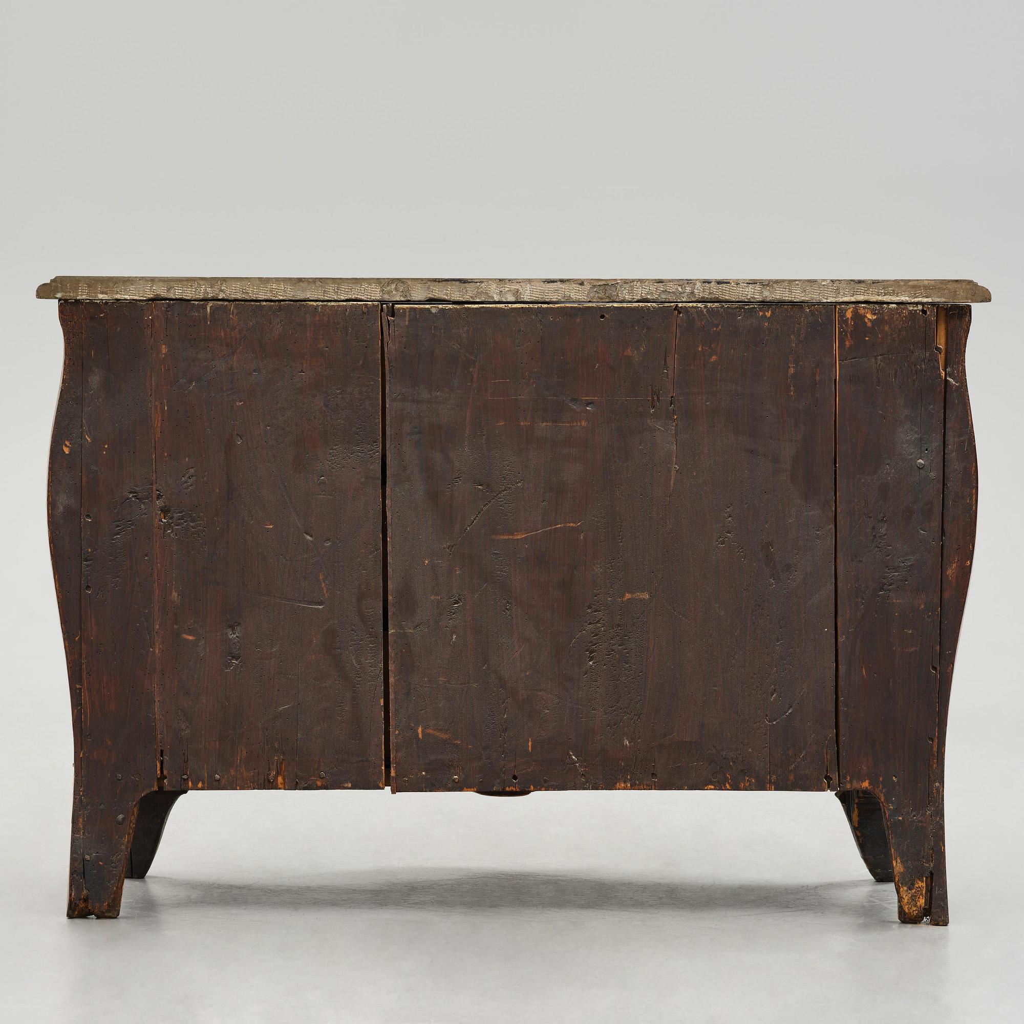 A rococo parquetry commode by C. G. Willkom (master in Stockholm 1763-65).