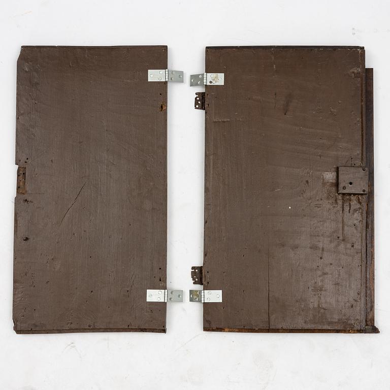 A pair of Baroque carved walnut doors, 17th/18th Century.