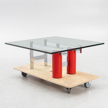 A coffee table with glass top, late 20th Century.