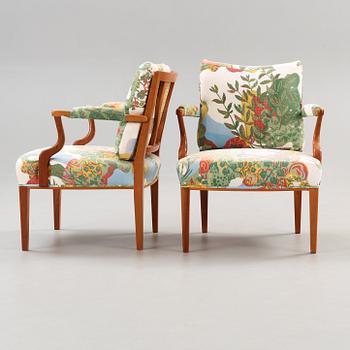 A pair of Josef Frank mahogany and rattan armchairs, Svenskt Tenn, model 969.