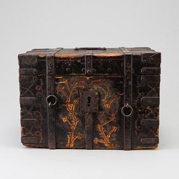 A wooden box, dated 1743.