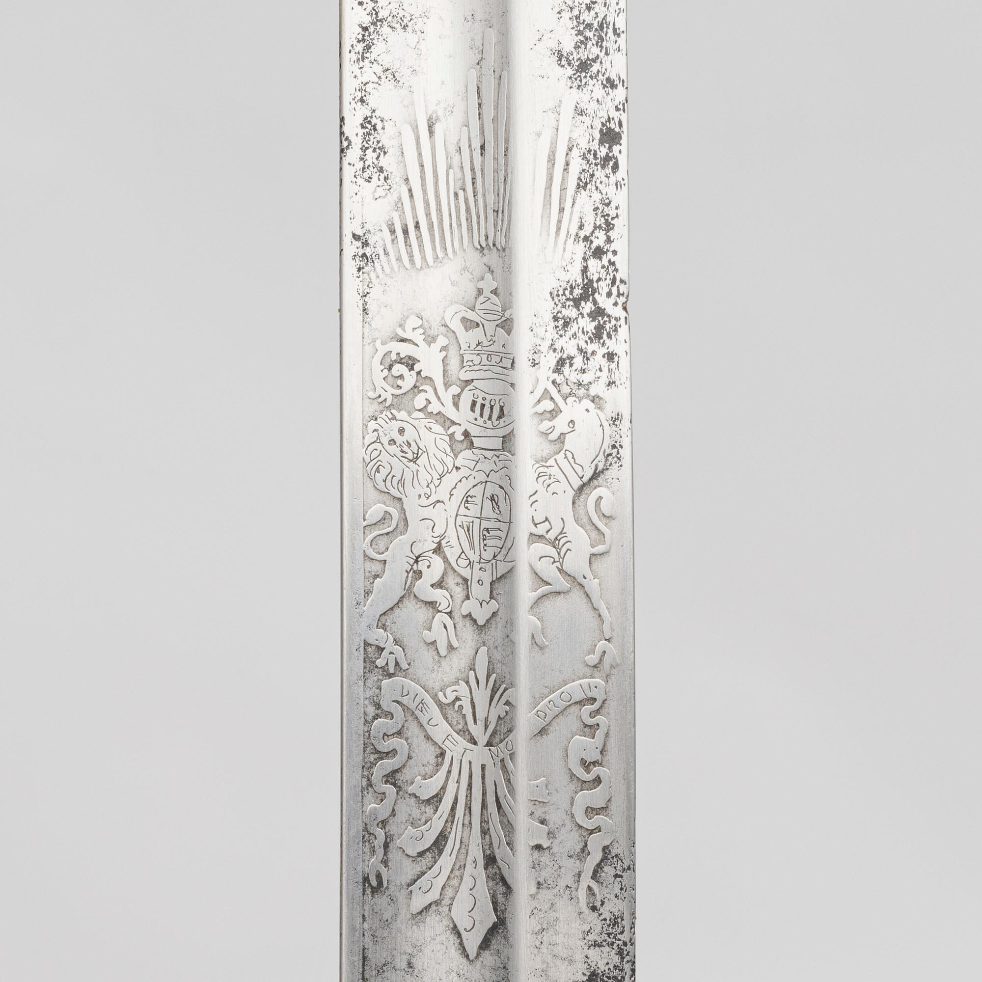 A Britiish Navy officer's sword 1827 pattern with scabbard.