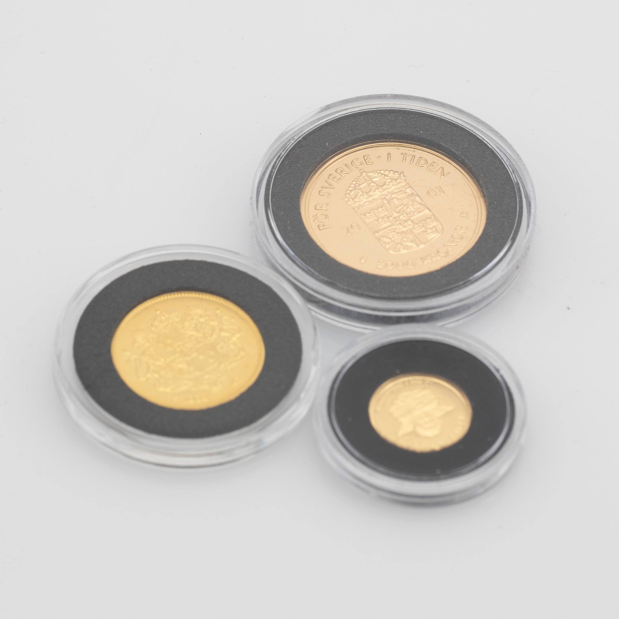 Guldmynt tre stycken, Sverige och Cook Island.